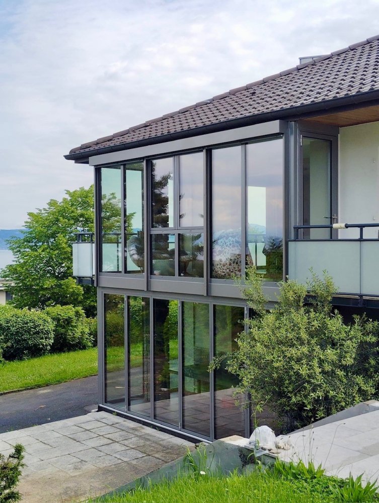 Création d'une extension entièrement vitrée sur deux niveaux avec une magnifique vue sur le lac Léman (74)