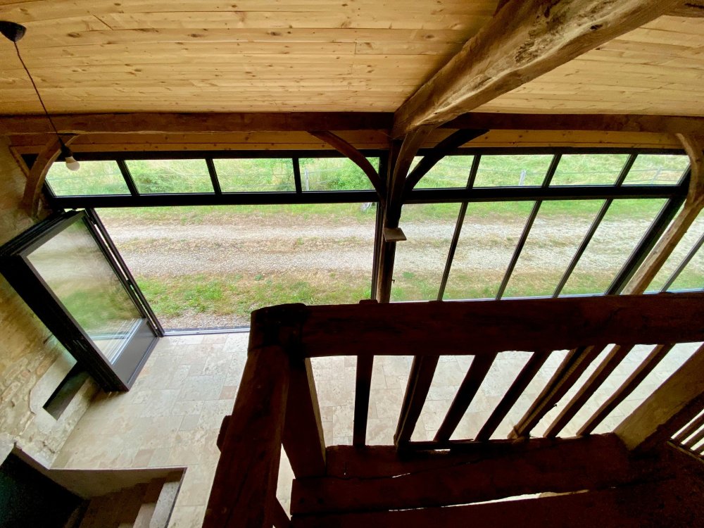 Extension d'une ancienne longère bressane avec nos systèmes aluminium en accordéon près de Bourg-en-Bresse dans l'Ain (01)