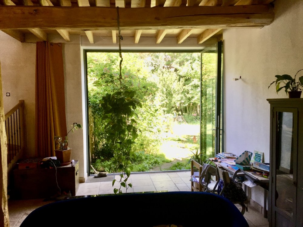 Rénovation d'une grange avec des baies accordéons