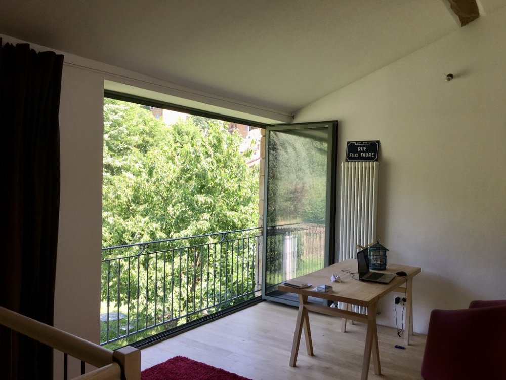 Rénovation d'une grange avec des baies accordéons